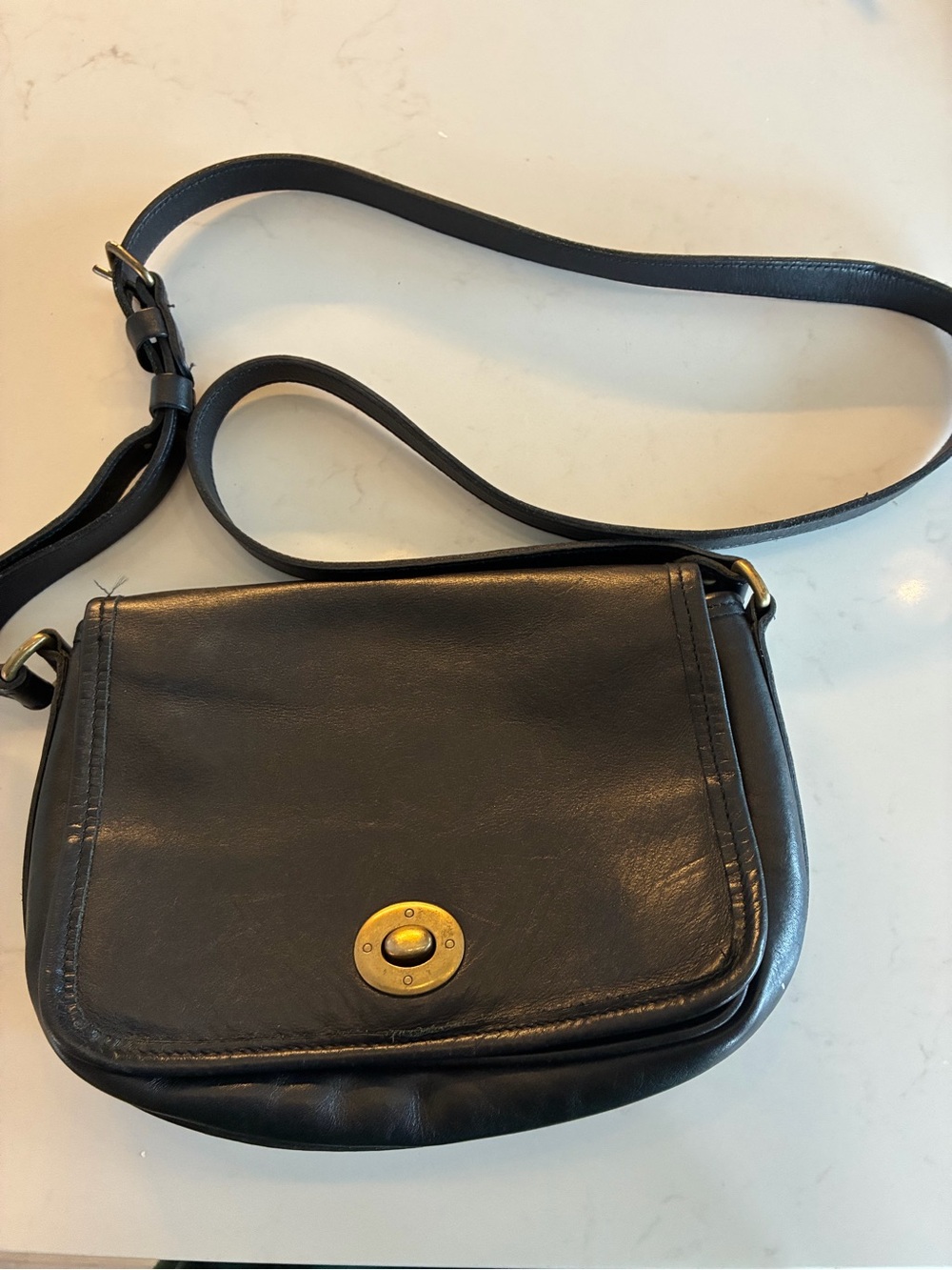 Vintage Roots Black Leather Crossbody Bag with Brass Hardware and Turn-Lock